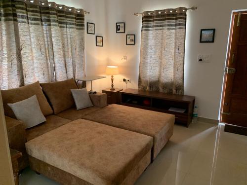 Ένα ή περισσότερα κρεβάτια σε δωμάτιο στο Sagar Niwas - Furnished short stay flats 1BHK and 2BHK