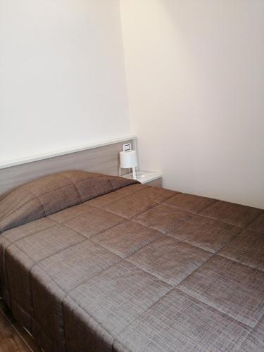 Una cama o camas en una habitación de Villa Niscima