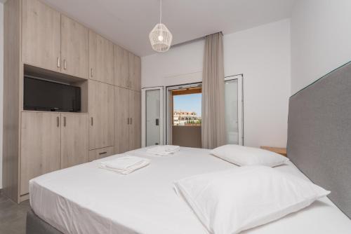 Un pat sau paturi într-o cameră la Babos Apartment