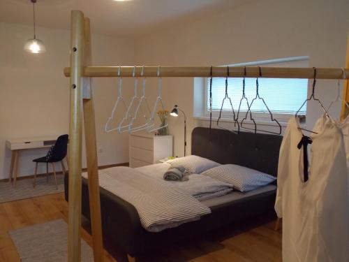 a bed in a room with a bunk bed with aitivity at Happy Guests apartment in Poprad