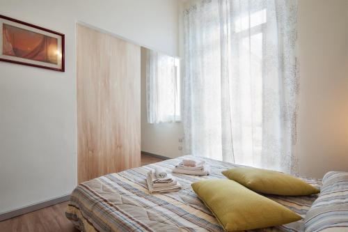 Ένα ή περισσότερα κρεβάτια σε δωμάτιο στο Casa Arsella