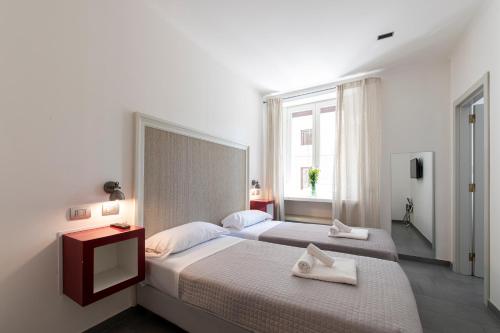 Кровать или кровати в номере Guest House Al Conservatorio