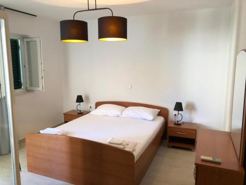 Säng eller sängar i ett rum på Adriatic House
