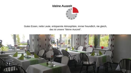a screenshot of a restaurant with white tables and chairs at Bremer Schlüssel in Braunlage