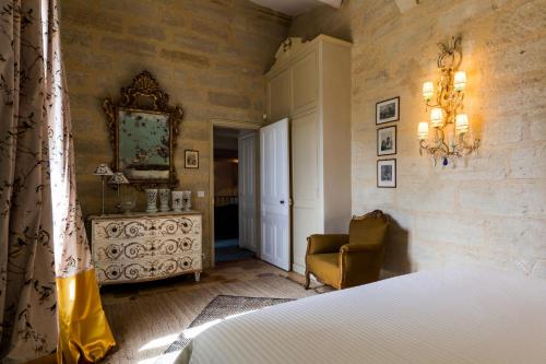 Ένα ή περισσότερα κρεβάτια σε δωμάτιο στο Le domaine des Oréades