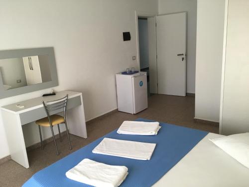 Postel nebo postele na pokoji v ubytování Hotel Stolis