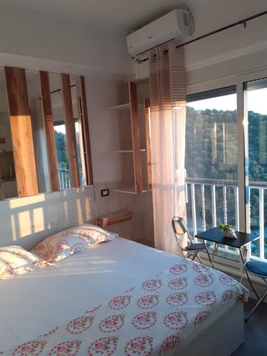 Ένα ή περισσότερα κρεβάτια σε δωμάτιο στο Vila Oliven