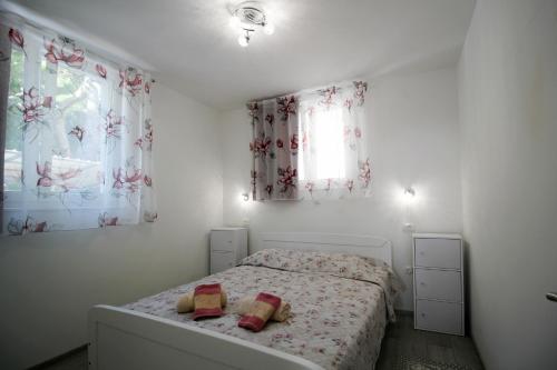Postel nebo postele na pokoji v ubytování Apartment Kala