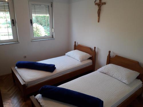 Ένα ή περισσότερα κρεβάτια σε δωμάτιο στο Medjugorje Perfect family house