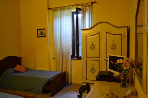 Katil atau katil-katil dalam bilik di Agriturismo Mandrola