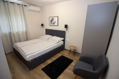 Postel nebo postele na pokoji v ubytování Villa Village Mostar