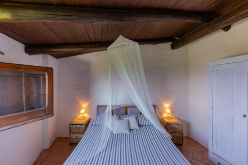 Postel nebo postele na pokoji v ubytování B&B Calandrella