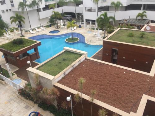 Vista de la piscina de Apartamento 3 Quartos em Frente à Praia do Forte o alrededores