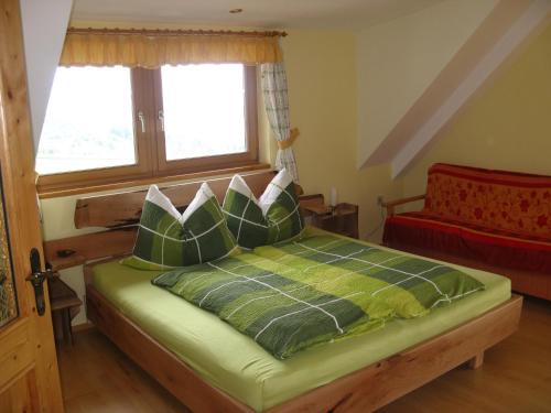 Postel nebo postele na pokoji v ubytování Ortnerhof
