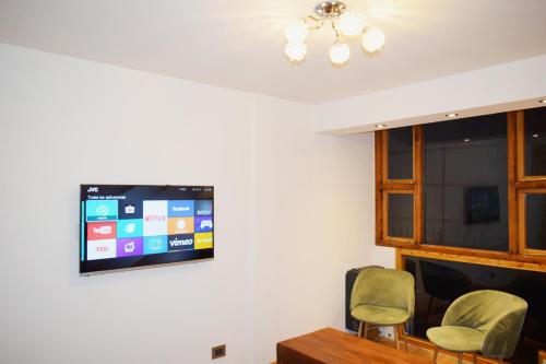 TV a/nebo společenská místnost v ubytování MaC Patagonia