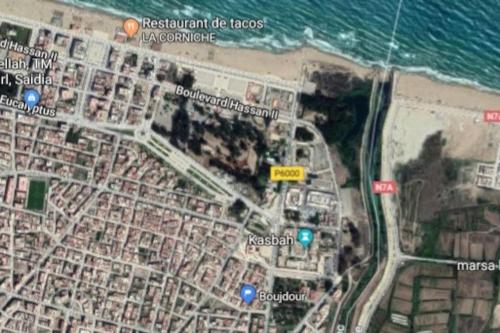a map of a beach with the ocean at Perle d'Azur F3 in Saidia 