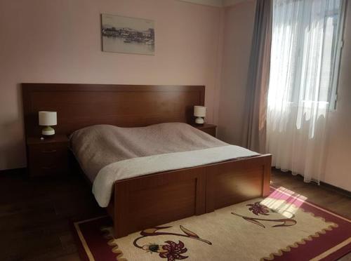 Postel nebo postele na pokoji v ubytování Apartment Giorgi Mazniasvhili