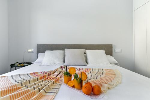 A bed or beds in a room at Townhouse Tonina