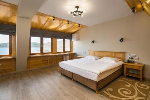 Postel nebo postele na pokoji v ubytování Anastasia Hotel