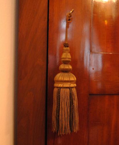 a tassel hanging on a wooden door at Appartement-Hotel an der Riemergasse in Vienna