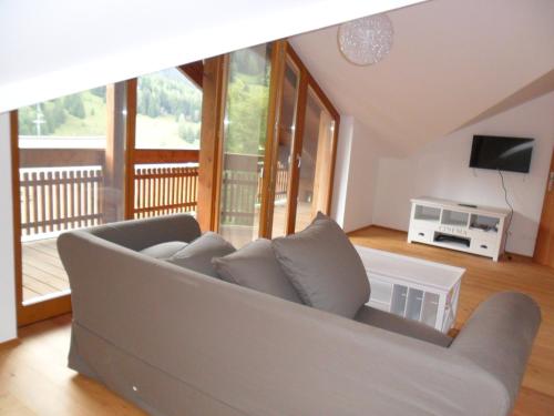 Televízia a/alebo spoločenská miestnosť v ubytovaní Residence Margerithenweg - Kärnten Card Sommer 2025 inklusive