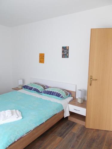 Ένα ή περισσότερα κρεβάτια σε δωμάτιο στο Apartment Oreskovic