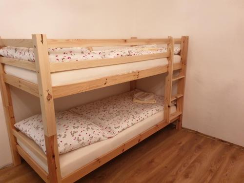 a couple of bunk beds in a room at Apartmán 33 in Teplice nad Metují