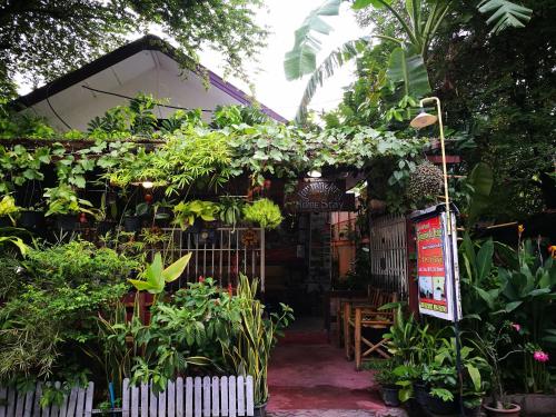 a garden shop with a lot of plants at Jimmy and Jeng Homestay in Chiang Mai