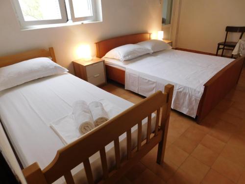 Cama o camas de una habitación en Charming house Tonći