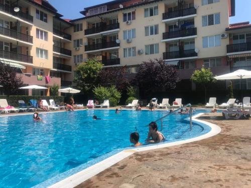 a group of people in the swimming pool at a hotel at Black Sea Wellnest in Aheloy