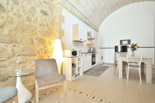 A kitchen or kitchenette at ragusa curtigghiu