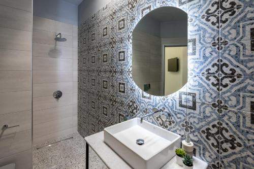 Ванная комната в Casa Poli Suites