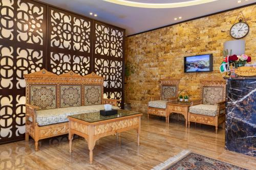 TV o dispositivi per l'intrattenimento presso Town Season Hotel