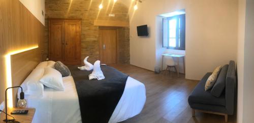 TV a/nebo společenská místnost v ubytování A Casa da Botica