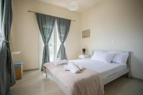 Postel nebo postele na pokoji v ubytování Hill House