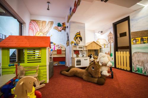 a room filled with lots of different types of toys at Ski & Wellness Residence Družba in Demanovska Dolina