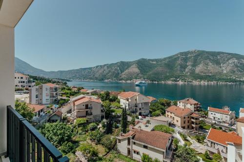 a view of a town on the water with houses at Boutique Hotel Casa del Mare - Vizura in Kotor