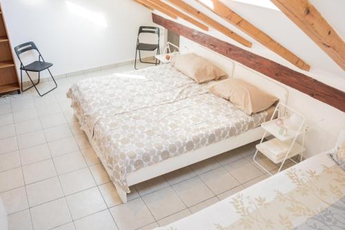 an overhead view of a bed in a room at Old City House in Koper