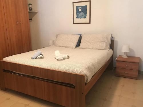 Ένα ή περισσότερα κρεβάτια σε δωμάτιο στο Il bilocale della nonna