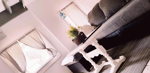 TV a/nebo společenská místnost v ubytování Ferienwohnung Rosenheim