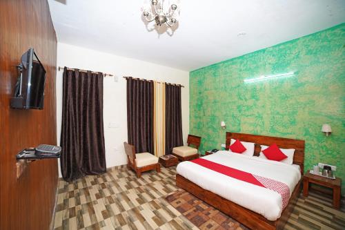 Postel nebo postele na pokoji v ubytování Tathastu Resort