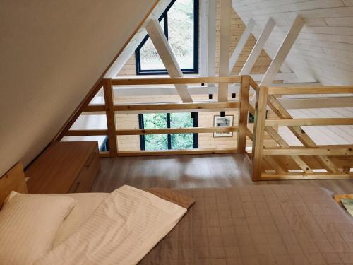 Posteľ alebo postele v izbe v ubytovaní BagriWood Lodges (Лоджі БагріВуд)