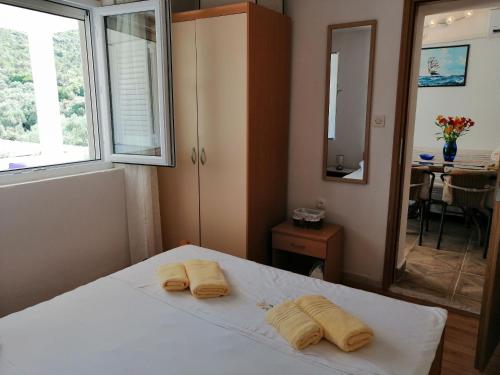 Ένα ή περισσότερα κρεβάτια σε δωμάτιο στο Apartment Zarace