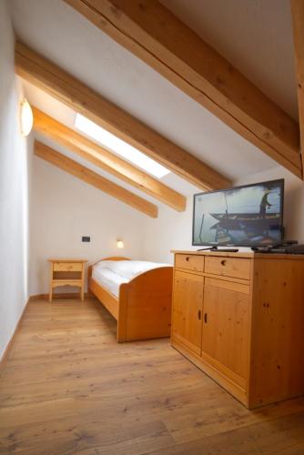 Postel nebo postele na pokoji v ubytování Residence Miramonti