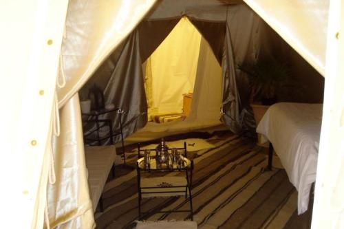 Una cama o camas en una habitación de Camp Mars