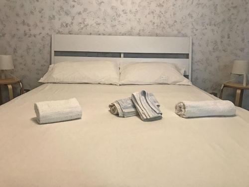 Postel nebo postele na pokoji v ubytování Bilocale a due passi dal Gran Paradiso