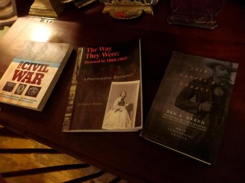 three books sitting on top of a table at Mulberry Lavender Farm and B&B in Mulberry