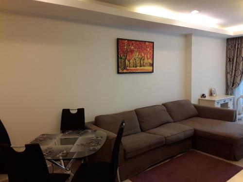 Ruang duduk di Cosy Beach View Apartments