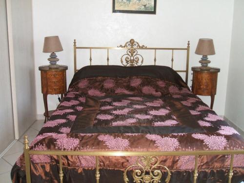 Säng eller sängar i ett rum på Dolce-Nido