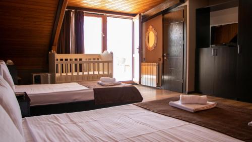 מיטה או מיטות בחדר ב-Hotel New Metekhi